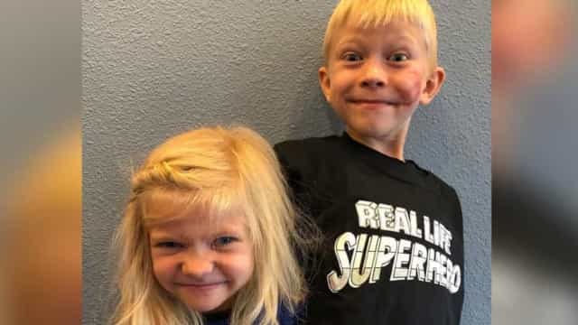 Menino que enfrentou cão que atacava irmã tem "orgulho" das cicatrizes