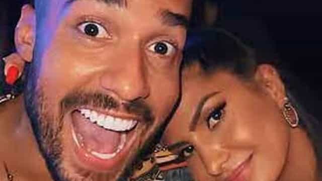 Bil e Marina, de A Fazenda 13, são vistos aos beijos em festa