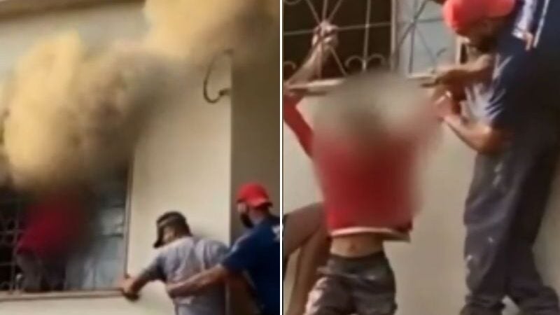 Vizinhos quebram janela e salvam menino de incêndio em casa. VÍDEO