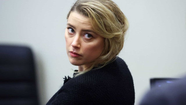 Amber Heard diz que encerrou briga com Johnny Depp